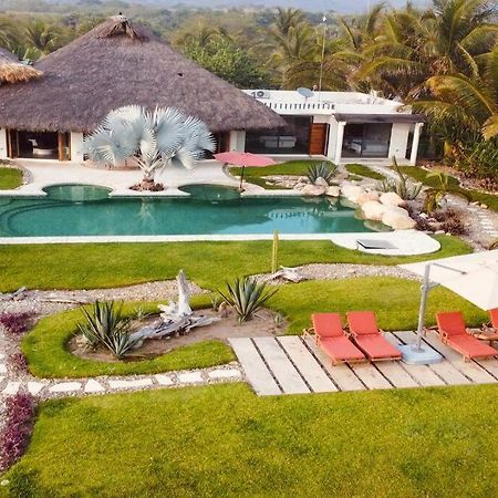 Villa De Las Rocas ปูแอร์โตเอสกอนดิโด ภายนอก รูปภาพ