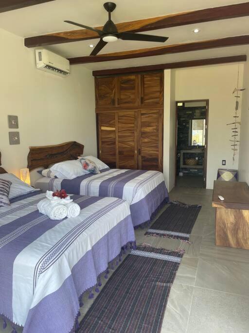 Villa De Las Rocas ปูแอร์โตเอสกอนดิโด ภายนอก รูปภาพ