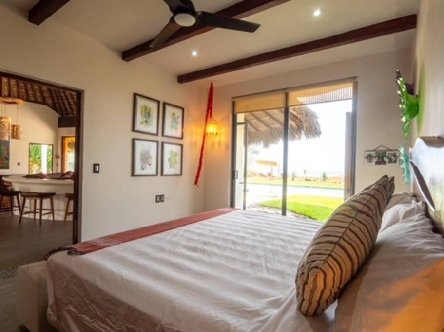Villa De Las Rocas ปูแอร์โตเอสกอนดิโด ภายนอก รูปภาพ