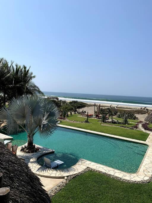 Villa De Las Rocas ปูแอร์โตเอสกอนดิโด ภายนอก รูปภาพ