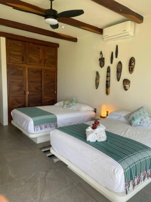 Villa De Las Rocas ปูแอร์โตเอสกอนดิโด ภายนอก รูปภาพ