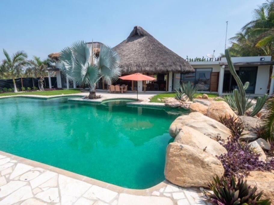 Villa De Las Rocas ปูแอร์โตเอสกอนดิโด ภายนอก รูปภาพ
