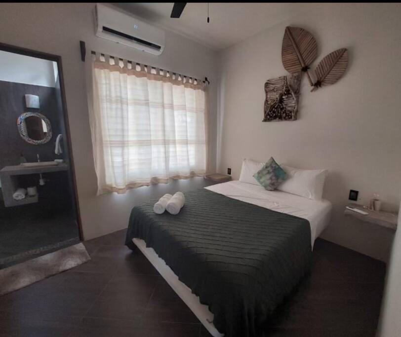 Villa De Las Rocas ปูแอร์โตเอสกอนดิโด ภายนอก รูปภาพ