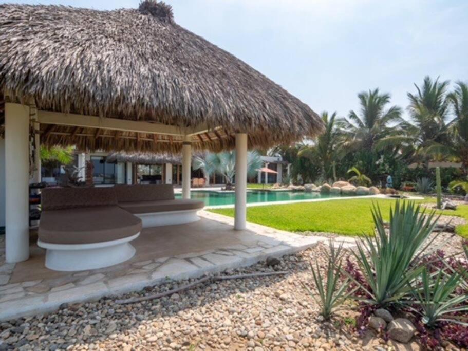 Villa De Las Rocas ปูแอร์โตเอสกอนดิโด ภายนอก รูปภาพ