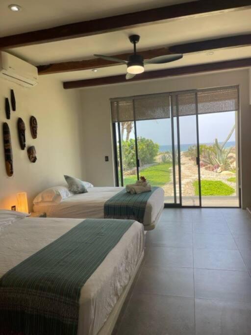 Villa De Las Rocas ปูแอร์โตเอสกอนดิโด ภายนอก รูปภาพ