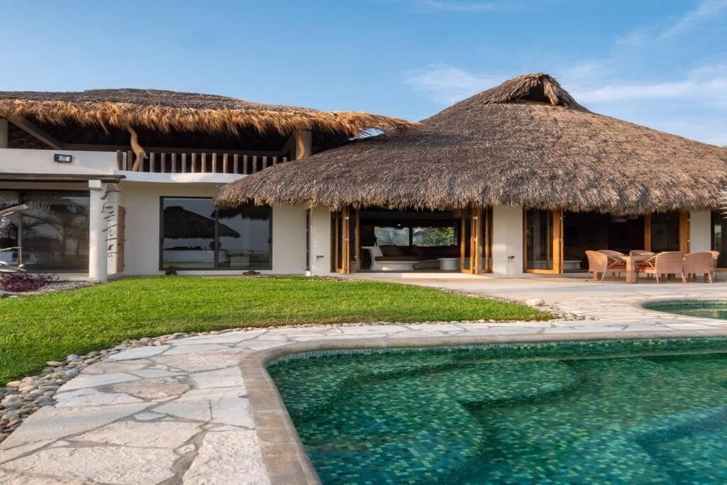 Villa De Las Rocas ปูแอร์โตเอสกอนดิโด ภายนอก รูปภาพ